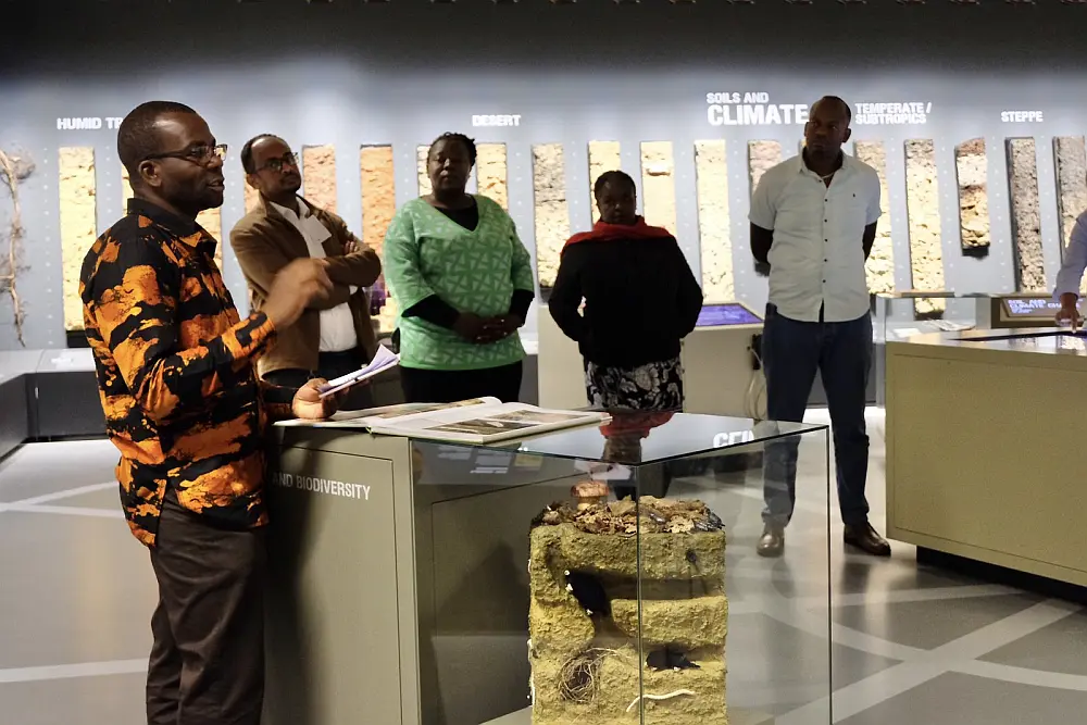 "Michael Okoti (KALRO) summarizes the previous day’s takeaways at the Annual Project Meeting in the ISRIC World Soil Museum on the campus of Wageningen University & Research."