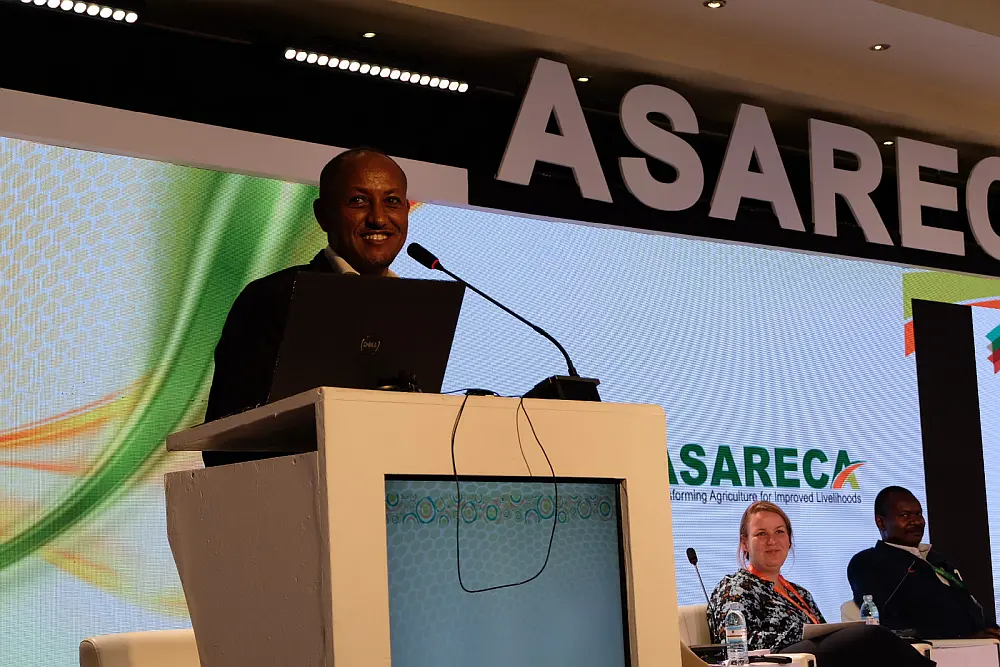 "Ermias Betemariam, ICRAF, moderates the projects ASARECA session in Uganda."