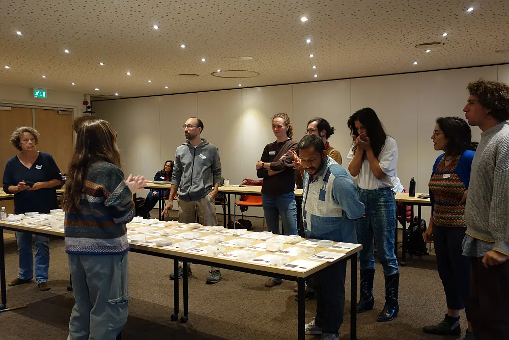 Participants during soil tasting session with representatives of the Museum of Edible Earth