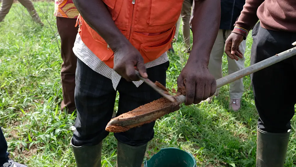 "Demonstration of the field sampling technique at the 2023 Soils4Africa Annual Project Meeting. "