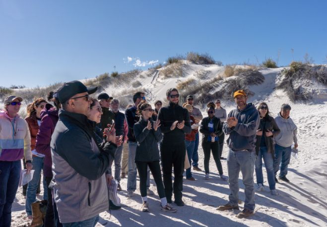 " Colby Brungard from New Mexico State University explaining how the White Sands formed. Photo by Christine Stockwell."