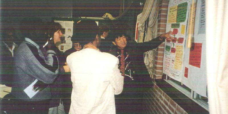 participants presenting a poster during the information market